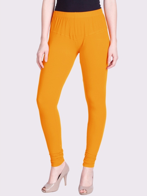 

LYRA Women Orange Solid Snug-Fit Churidar Length Leggings, Yellow