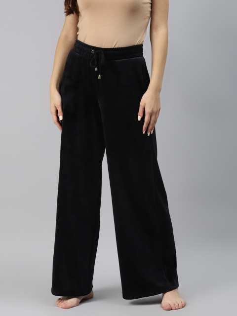 

Marks & Spencer Women Black Solid Velvet Finish Flared Lounge Pants