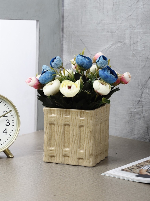 

The Decor Mart Beige Textured Ceramic Planter