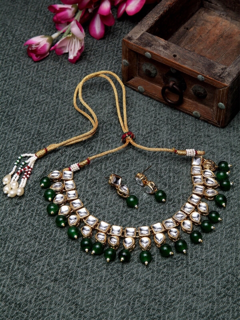 

Shining Diva Gold-Plated & White Kundan Stone Studded & Green Beaded Jewellery set
