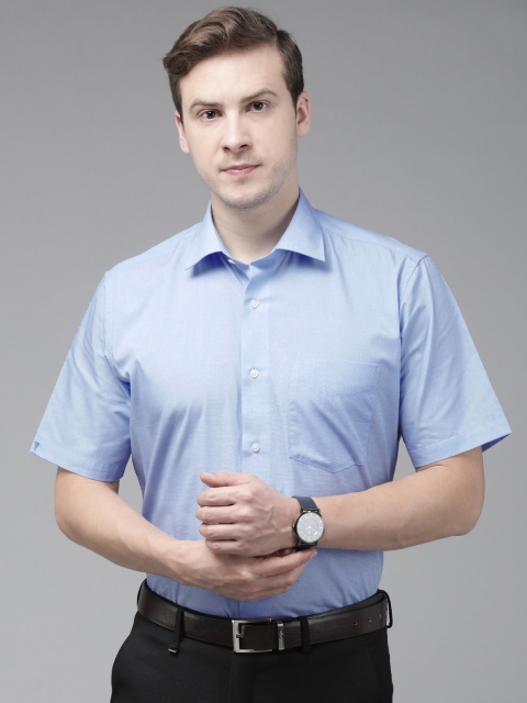 

Van Heusen Men Blue Solid Custom Fit Formal Shirt