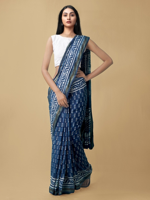 

Unnati Silks Blue & White Warli Pure Cotton Dabu Saree
