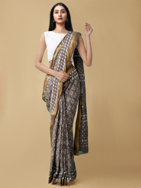 

Unnati Silks Grey & White Dabu Pure Cotton Dabu Saree