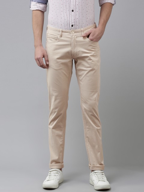

Van Heusen Sport Men Beige Solid Tapered Fit Trousers