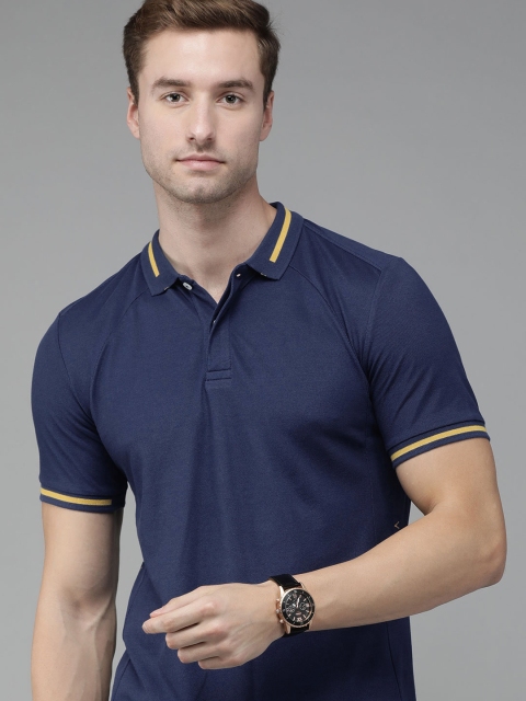 

Van Heusen Men Blue Solid Pure Cotton Polo Collar T-shirt