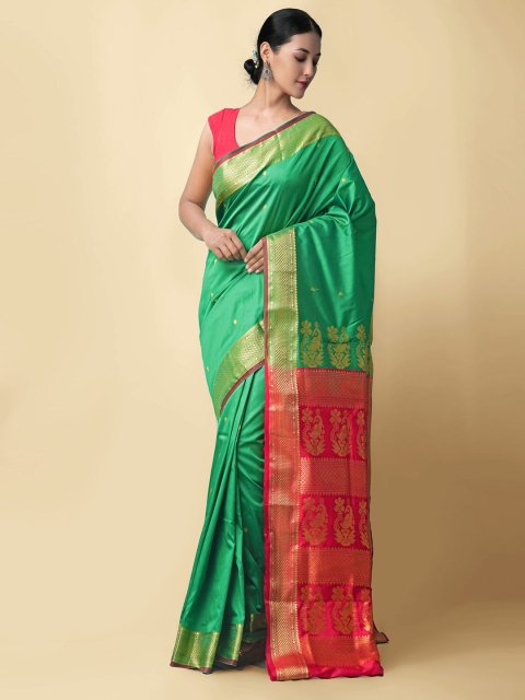 

Unnati Silks Green & Pink Ethnic Motifs Zari Silk Blend Kanjeevaram Saree