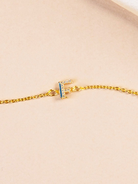 

Pipa Bella Teal Blue Gold-Plated Cubic Zirconia Studded Enamelled F Initial Link Bracelet
