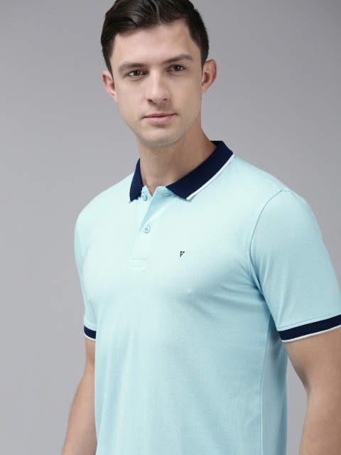 

Van Heusen Sport Men Blue Solid Polo Collar T-shirt