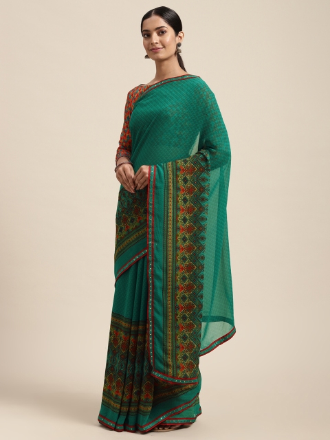 

Mitera Teal & Blue Ethnic Motifs Pure Georgette Saree