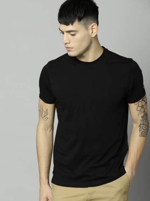 

FCUK Men Black Solid Round Neck T-shirt
