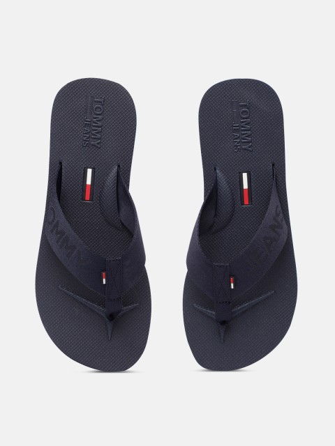 

Tommy Hilfiger Men Navy Blue Brand Logo Embossed & Textured Beach Thong Flip-Flops