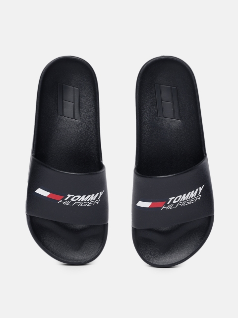 

Tommy Hilfiger Men Navy Blue & Black Printed Croslite Sliders