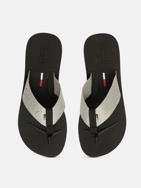 

Tommy Hilfiger Men Black & Grey Brand Logo Embossed & Textured Beach Thong Flip-Flops