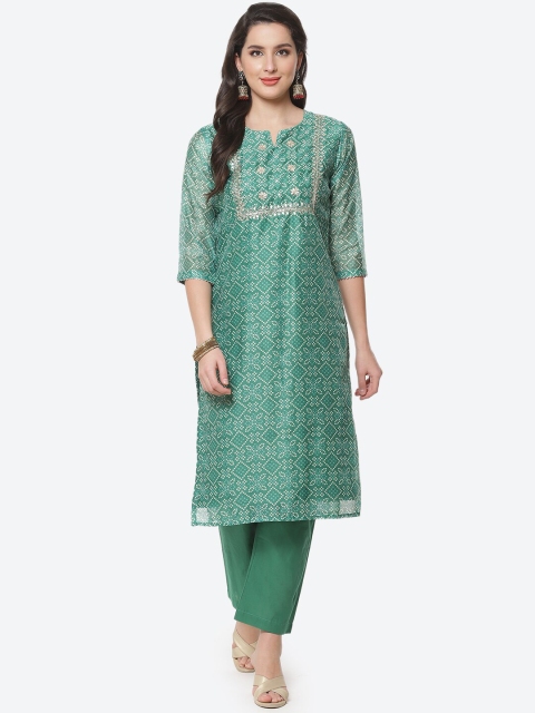 

Meena Bazaar Women Green Floral Printed Chanderi Cotton Kurta with Trousers