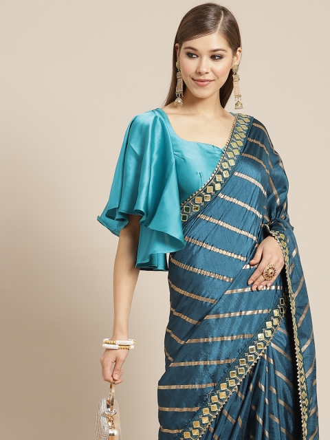 

Tikhi Imli Teal Blue & Gold Leheriya Foil Jaali Saree