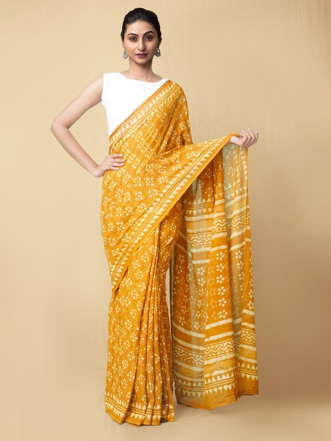 

Unnati Silks Orange & White Floral Pure Cotton Dabu Saree