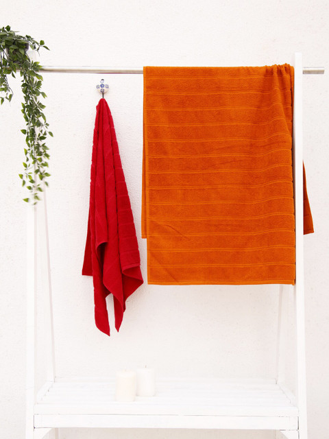 

Ariana Set Of 2 Maroon & Rust-Orange Solid 300 GSM Cotton Bath Towels