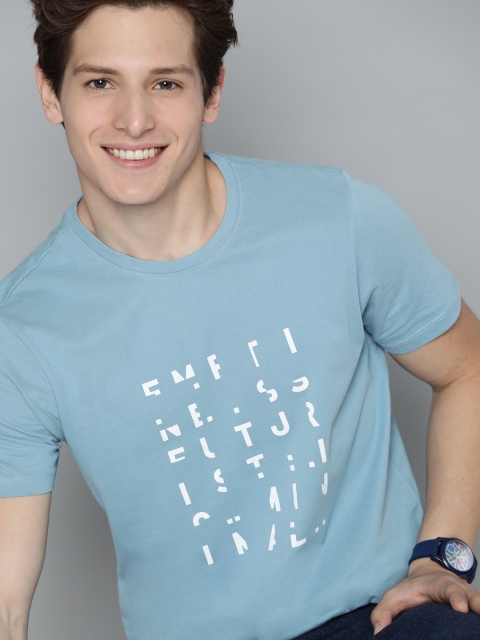 

Mast & Harbour Men Blue & White Pure Cotton Typography Printed T-shirt