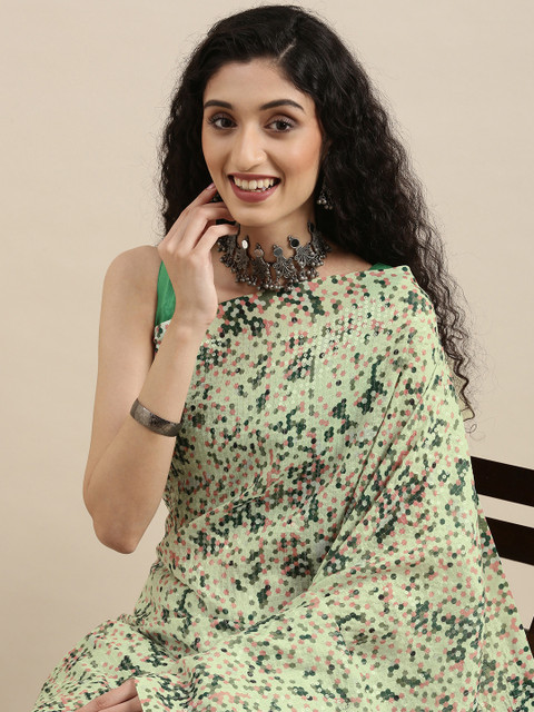 

Mitera Green Sequinned Pure Georgette Saree
