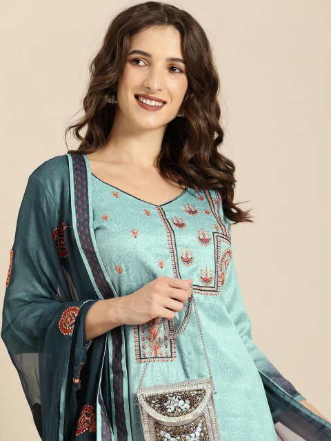 

Shaily Turquoise Blue & Orange Embroidered Satin Unstitched Dress Material