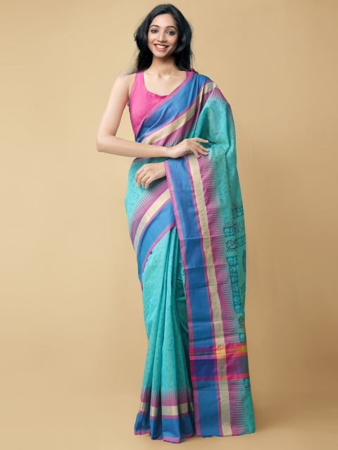 

Unnati Silks Blue & Purple Ethnic Motifs Silk Cotton Chanderi Saree