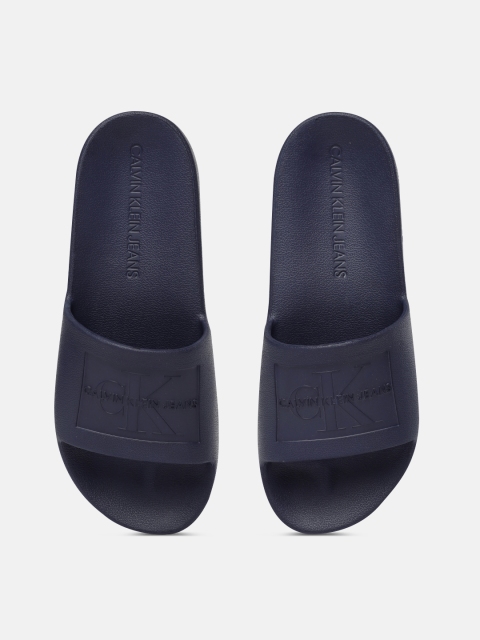 

Calvin Klein Men Blue Solid Sliders