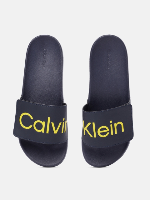 

Calvin Klein Men Navy Blue & Yellow Printed Sliders
