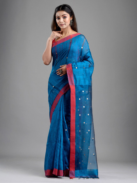 

Mitera Blue Woven Design Sequinned Art Silk Saree