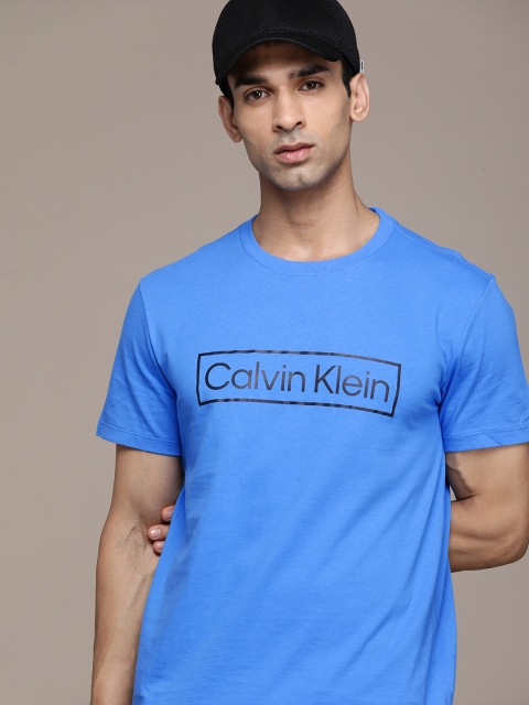 

Calvin Klein Jeans Men Blue & Black Typography Printed Pure Cotton Casual T-shirt