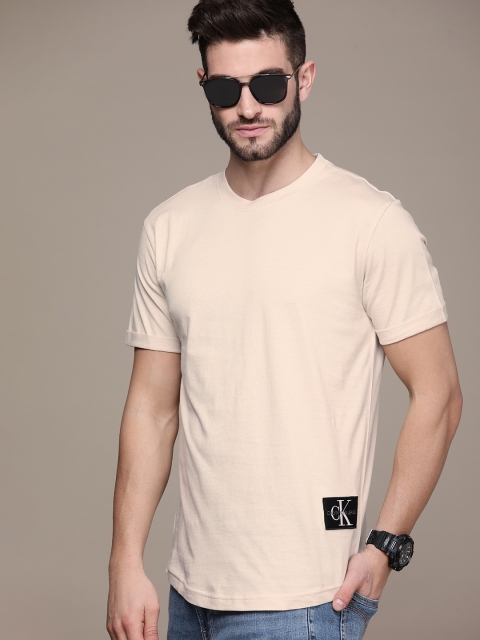 

Calvin Klein Jeans Men Beige Solid Organic Cotton T-shirt