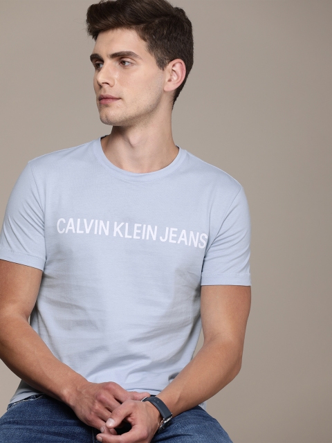 

Calvin Klein Jeans Men Blue Brand Logo Printed Slim Fit Pure Cotton T-shirt
