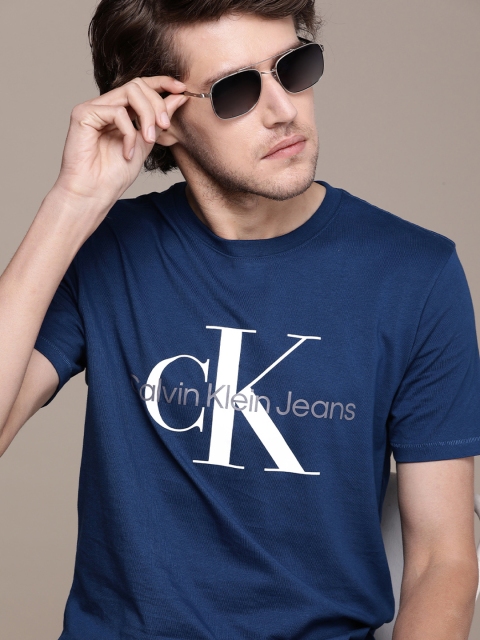 

Calvin Klein Jeans Men Navy Blue Pure Cotton Brand Logo Printed Slim Fit T-shirt