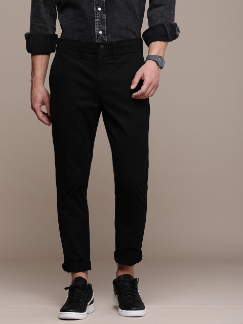 

Calvin Klein Jeans Men Black Solid Wrinkle Free Chinos Trousers