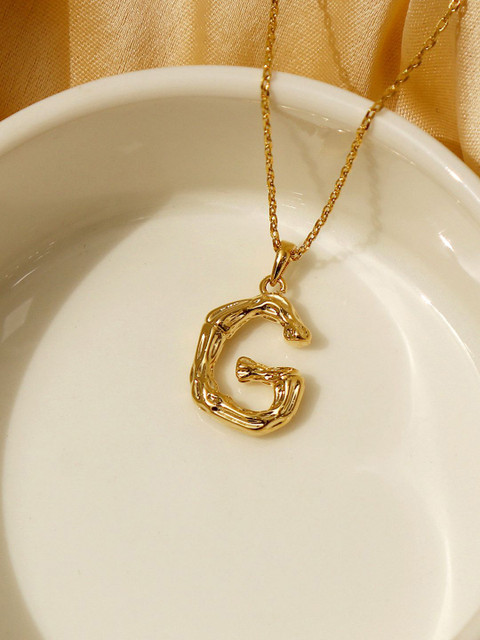 

Pipa Bella Women Gold-Plated Textured G Initial Pendant Necklace