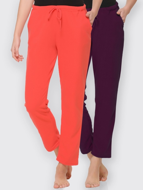 

Kanvin Women Pack of 2 Orange & Maroon Solid Pyjamas