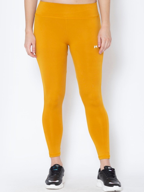 

MUSCLE TORQUE Women Yellow Solid Skinny-Fit Tights