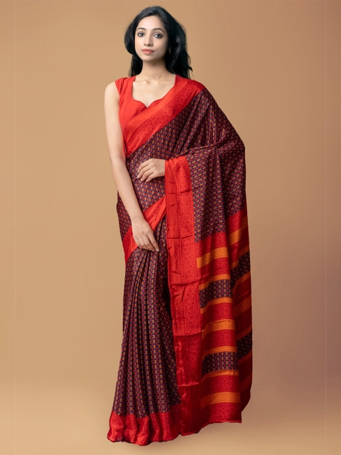 

Unnati Silks Red & Blue Ethnic Motifs Printed Crepe Silk Saree