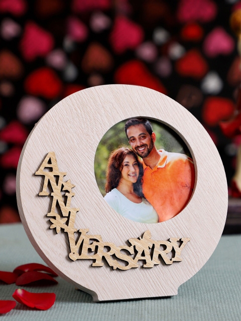 

Ferns N Petals Beige Wooden Round Anniversary Table Photo Frame