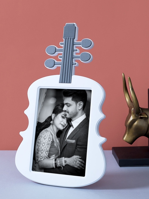 

Ferns N Petals Multicolor Guitar Shaped Photo Frame, Multi