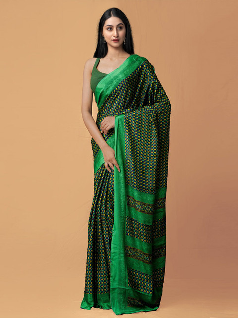 

Unnati Silks Green & Navy Blue Floral Patola Saree