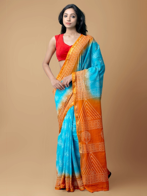 

Unnati Silks Blue & Orange Floral Pure Cotton Block Print Saree