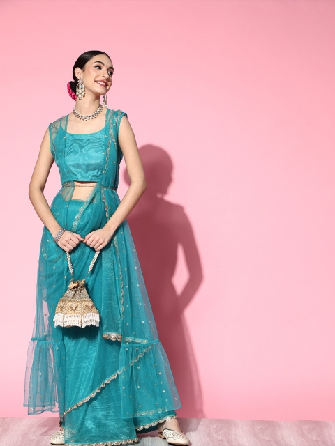 

Inddus Turquoise blue solid net saree with embroiderd jacket
