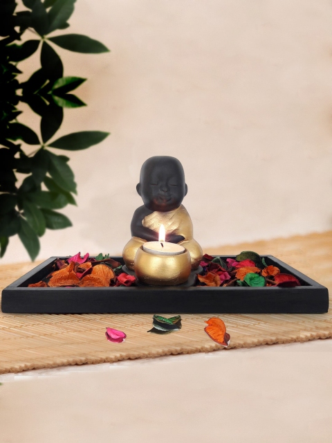 

TIED RIBBONS Black & Gold-Toned Decorative Buddha With Tray Flowers & Candle Showpiece