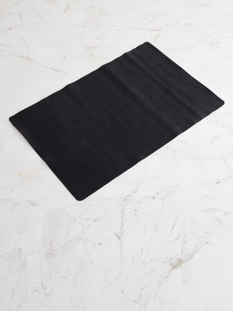 

Home Centre Black Solid Leather Placemat