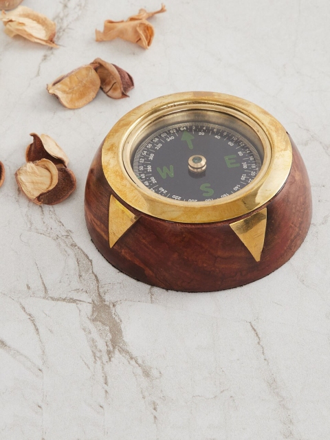 

Home Centre Brown & Gold-Toned Paper Weight Compass Showpiece