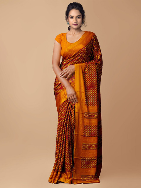 

Unnati Silks Maroon & Tan Ethnic Motifs Patola Saree