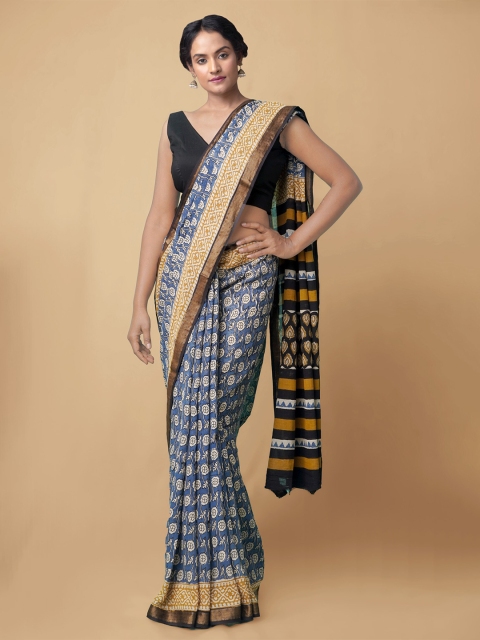 

Unnati Silks Blue & Mustard Floral Bagru Saree