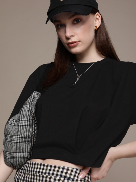 

Calvin Klein Jeans Women Black Solid Pure Cotton T-shirt