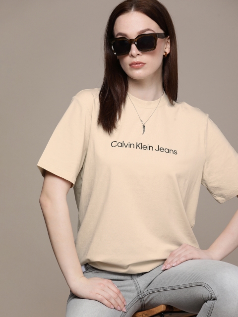 

Calvin Klein Jeans Women Beige Brand Logo Little Krishna Printed T-shirt