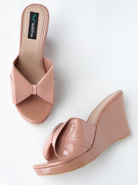 

Walkfree Women Peach-Coloured Wedge Heels with Bows